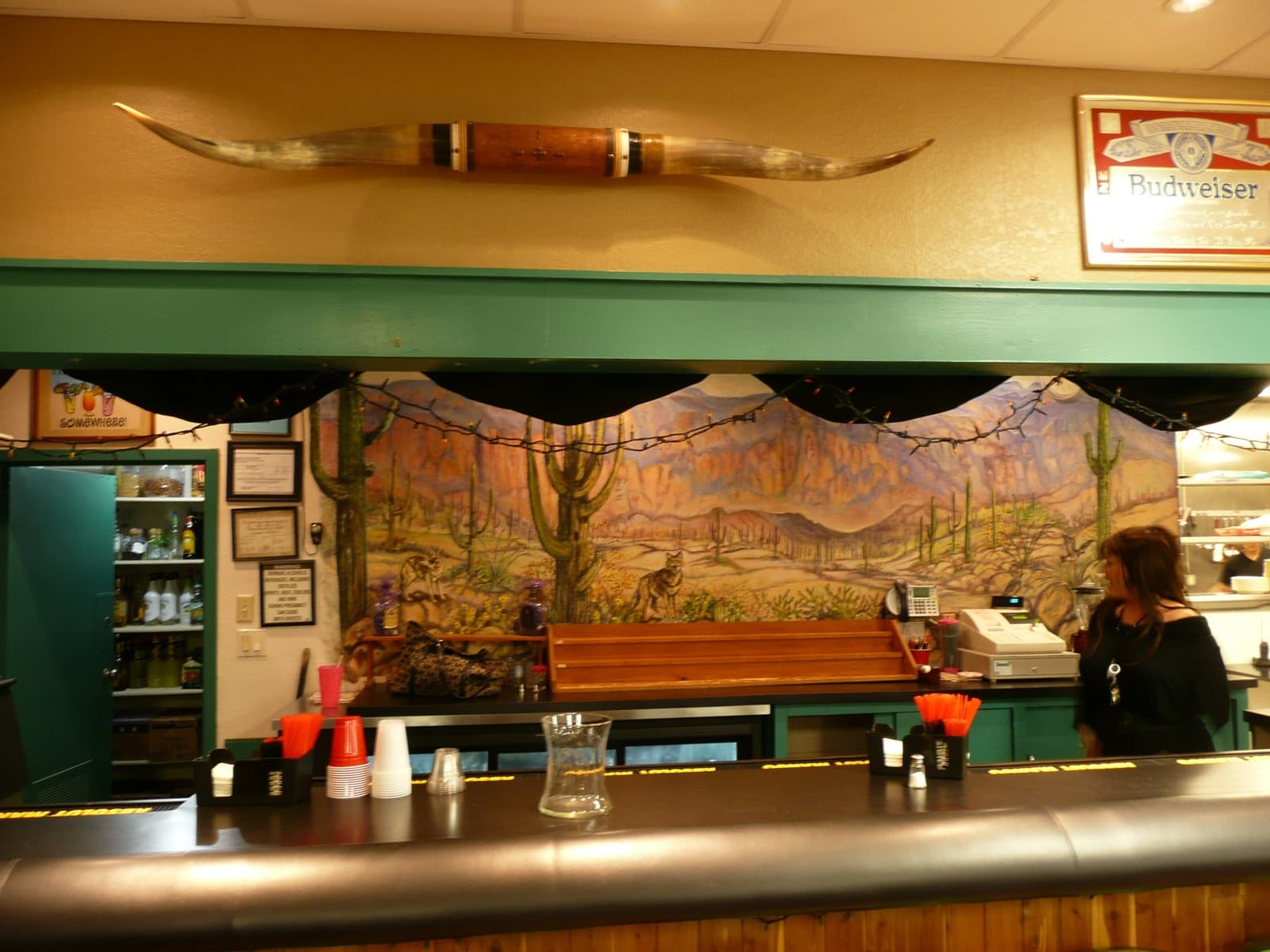 Clubhouse bar with stools and beer taps