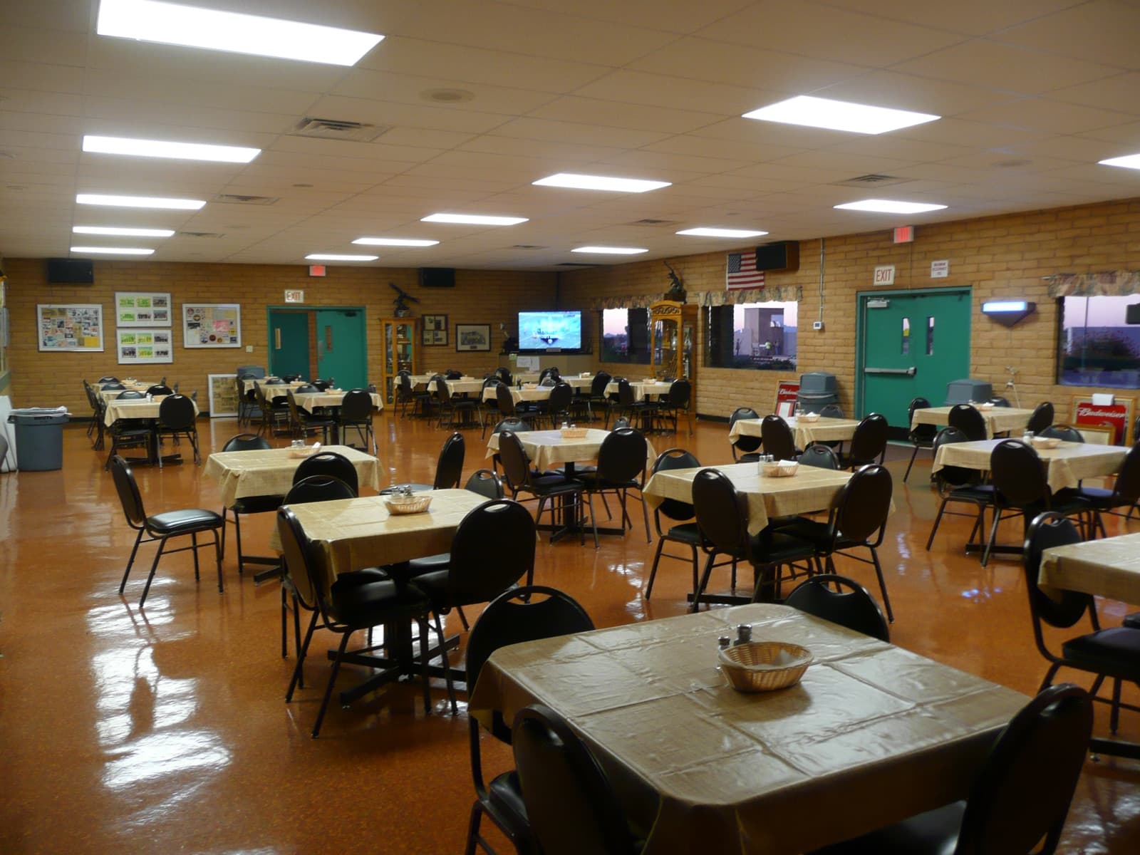Clubhouse dining room with tables set for service