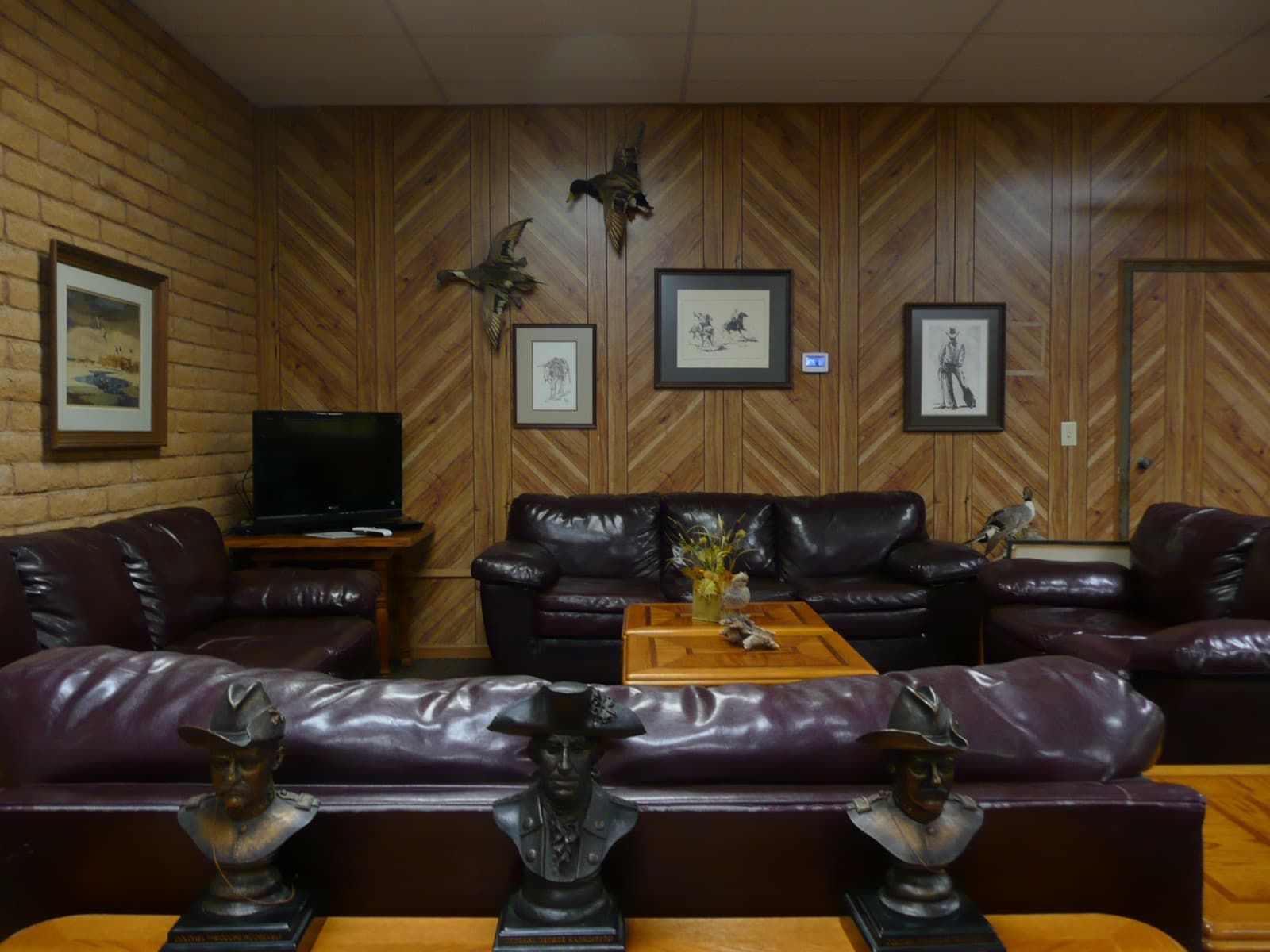 Levitz Lounge interior with leather seating and shotgun-themed decor