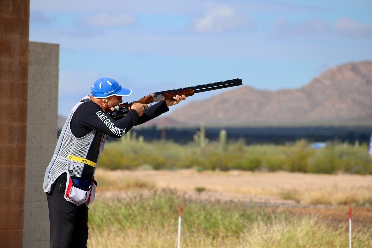 Skeet shooter calling pull from the high house station