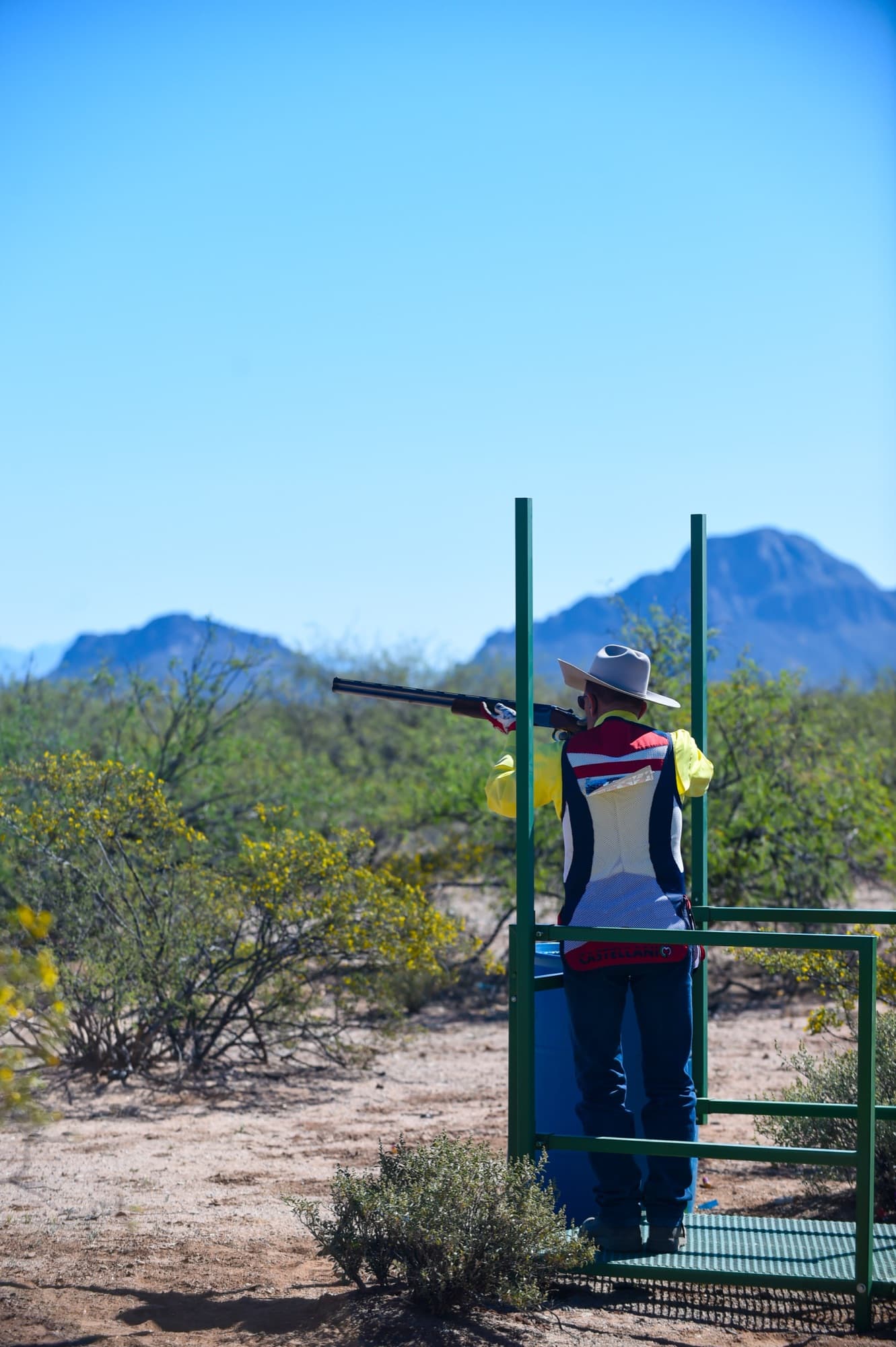 Sporting clays shooter on a Coyote Springs station